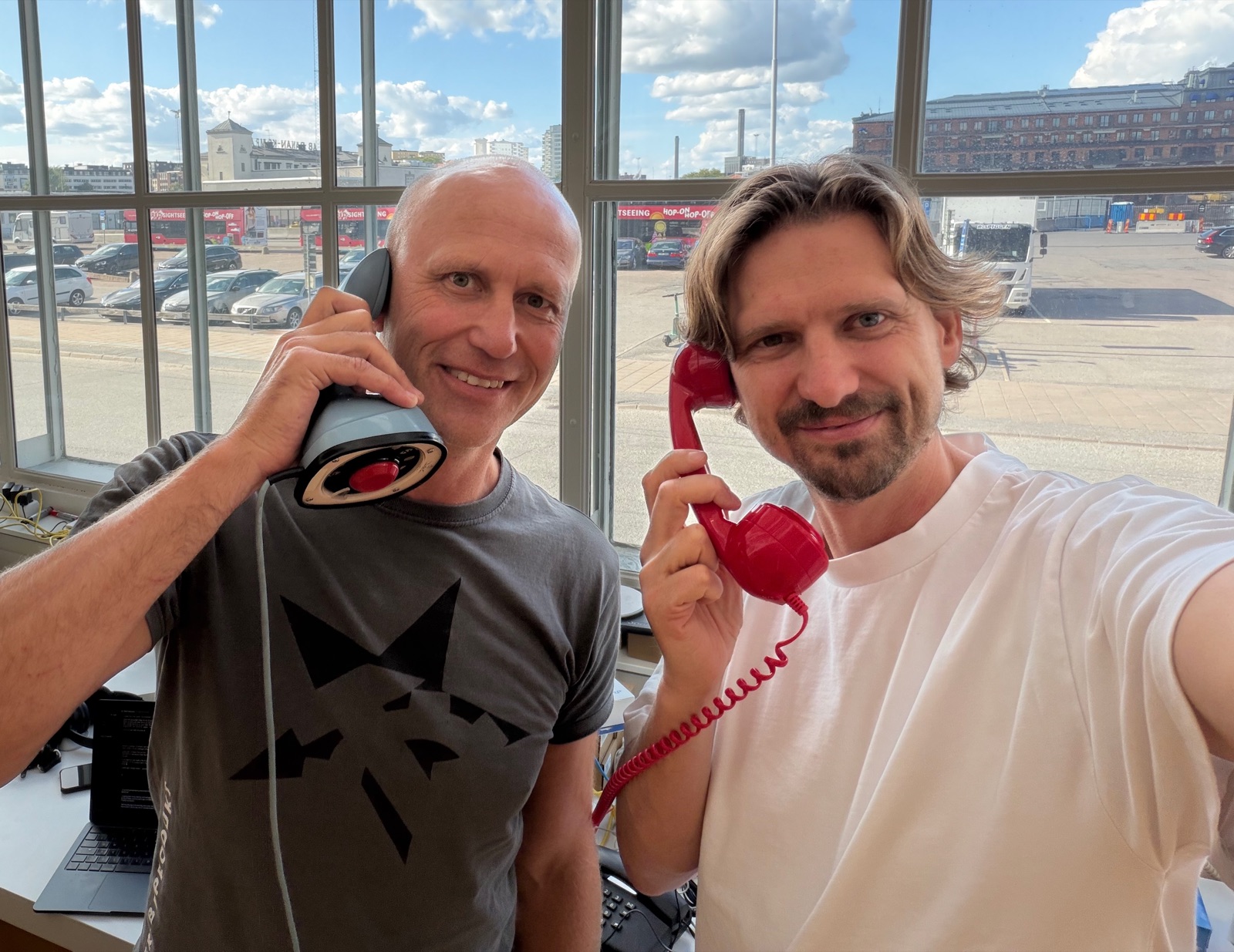 Greg and Andreas on the phone at the Barnluren office
